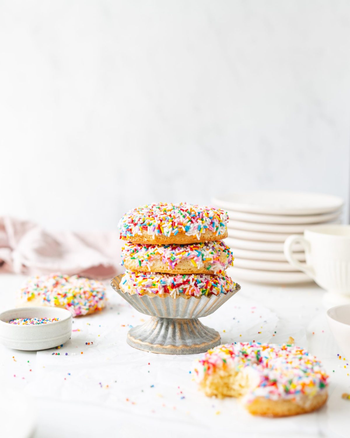Grain-free Vanilla Donuts with Cream Cheese Glaze stacked (straight on)