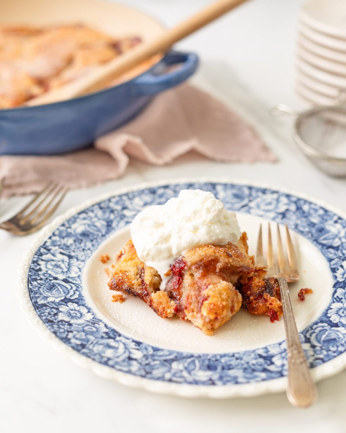 Gluten Free Strawberry Rhubarb Spoon Cake on a plate (straight on, close-up)