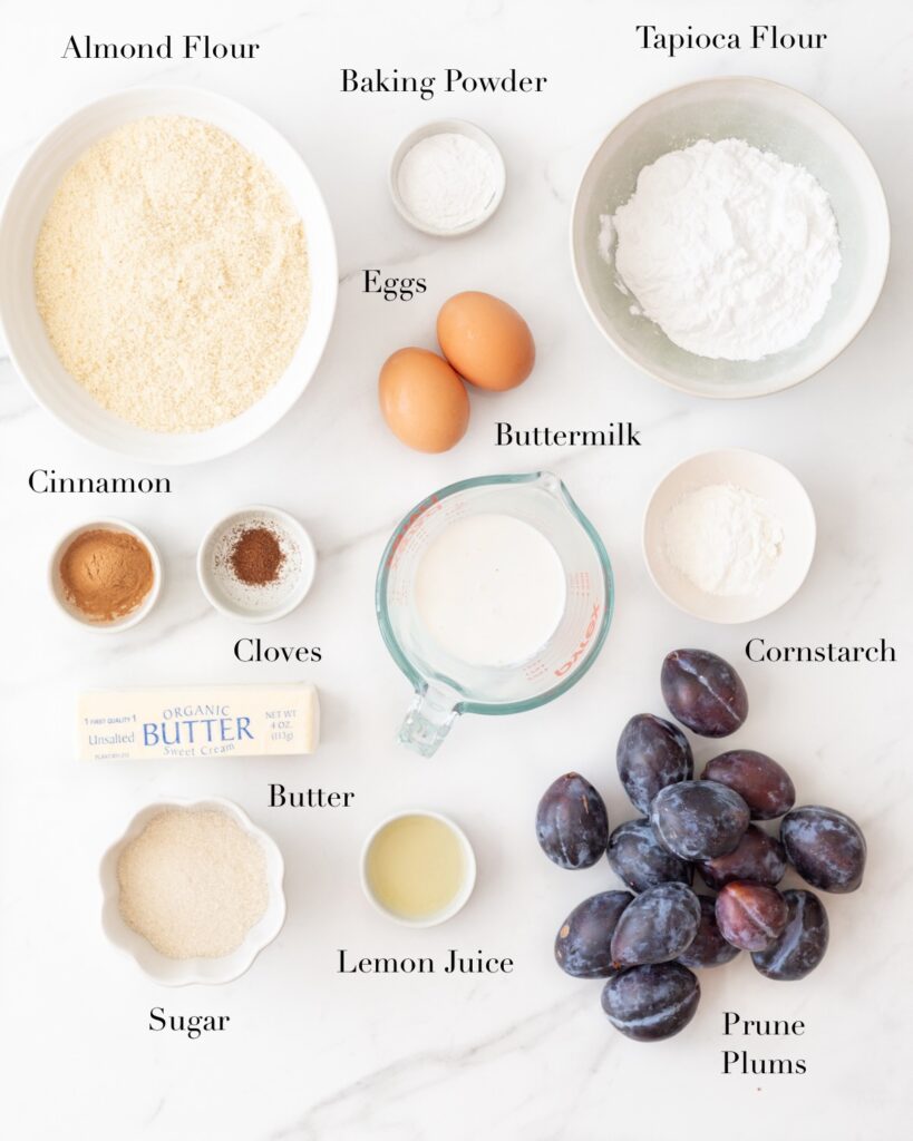 Ingredients for Gluten Free Prune Plum Cobbler portioned out on a marble slab.